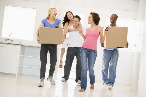 Local removals team handling boxes in Haroldpark